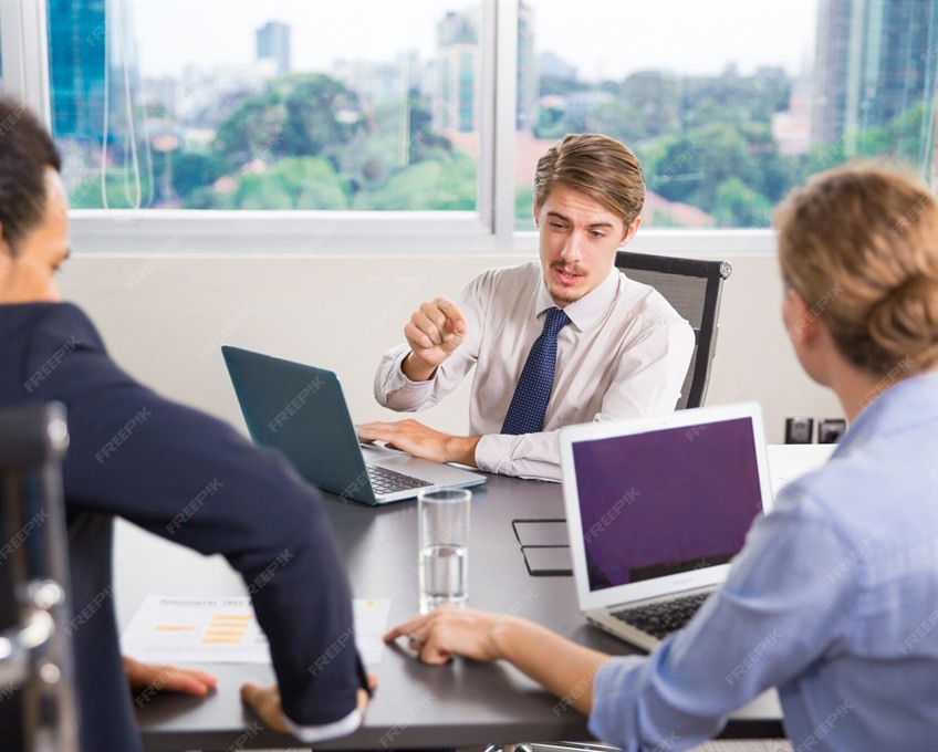 Business professionals planning workforce solutions